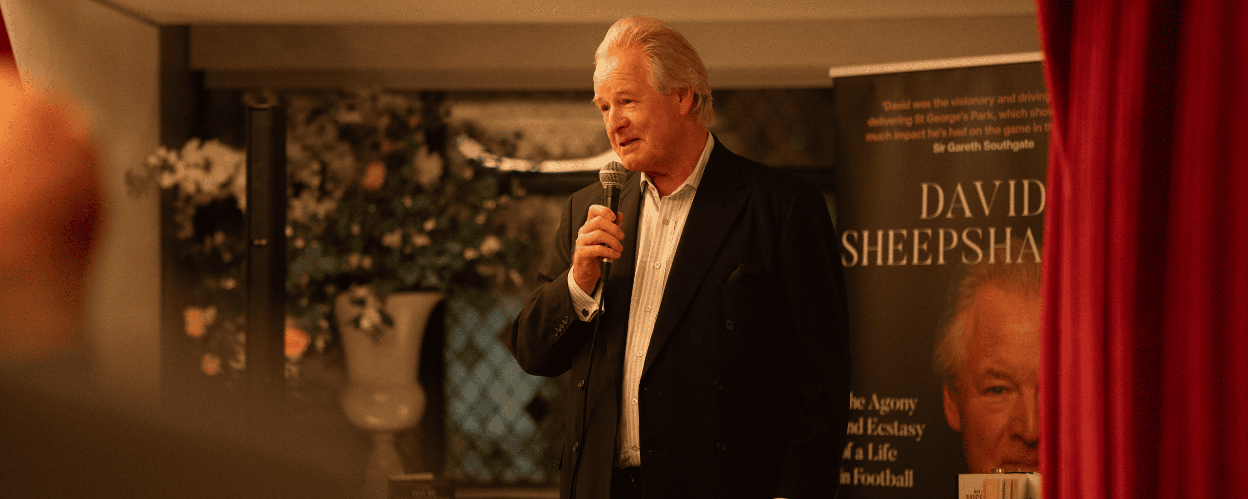 David Sheepshanks addresses the audience at his book launch for Man on a Mission